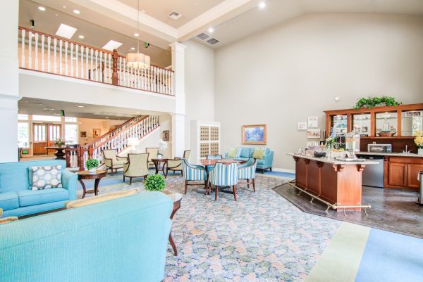 Another view of the lobby, with tables, armchairs, and couches