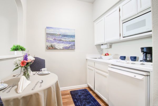 A small kitchenette and dining table