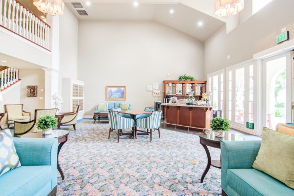 Another view of the lobby, with tables, armchairs, and couches