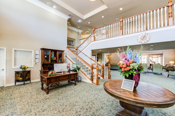 A large staircase with tables and chairs in the background