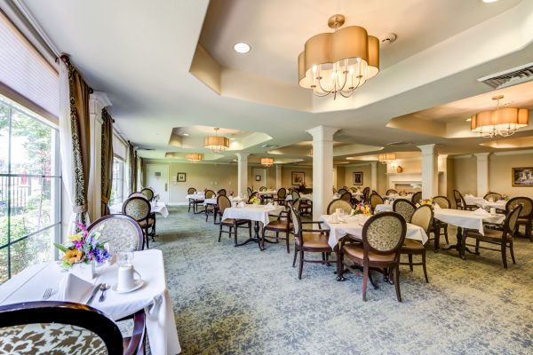 A large dining area with lots of tables and chairs