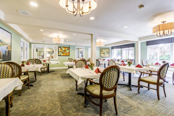 A large dining area with lots of tables and chairs