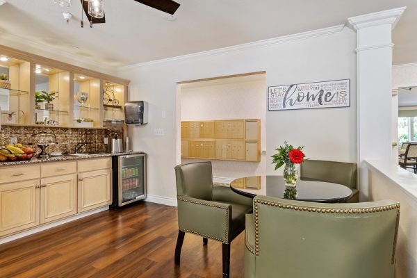 A cozy kitchen with a table and chairs