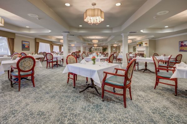 A seating area with lots of tables and chairs