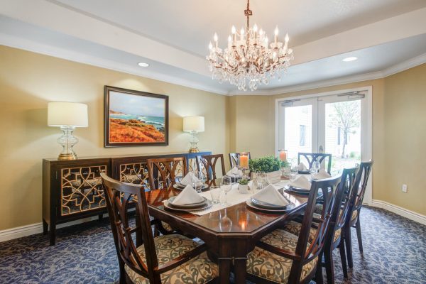 A large dining table and chairs