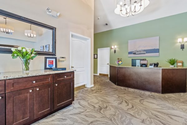 A reception area with a large desk