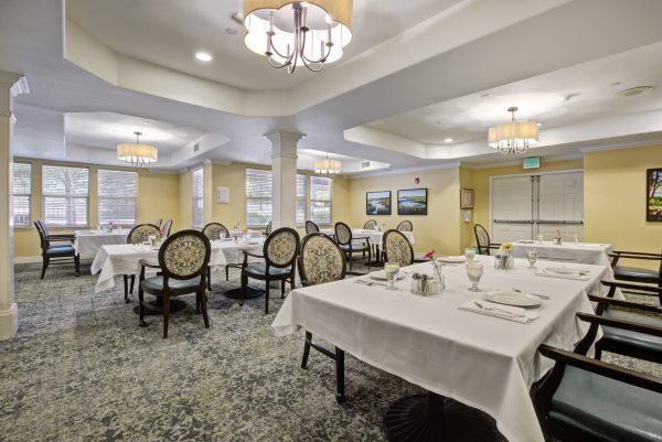 A large dining area with several tables and chairs