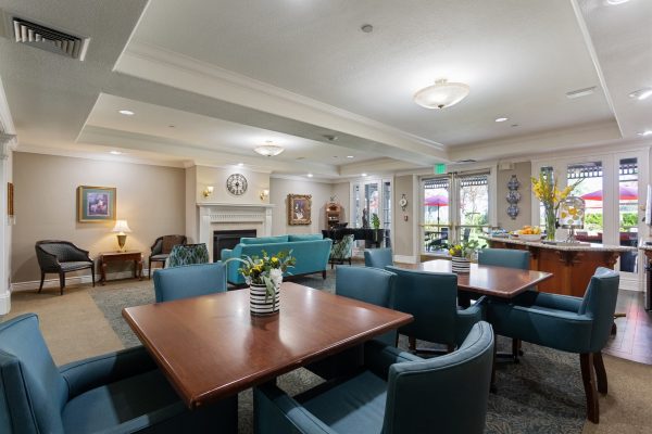 A large seating area with tables and chairs