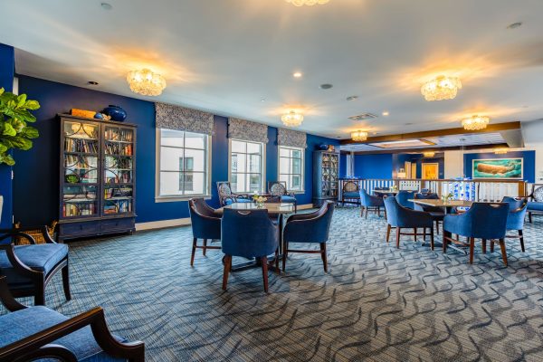 A large room with tables and chairs