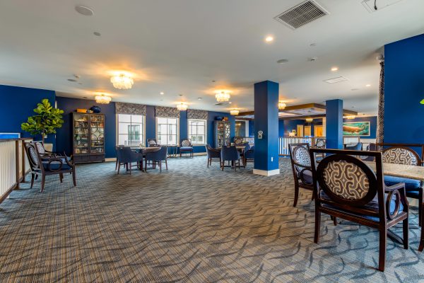 A large room with tables and chairs