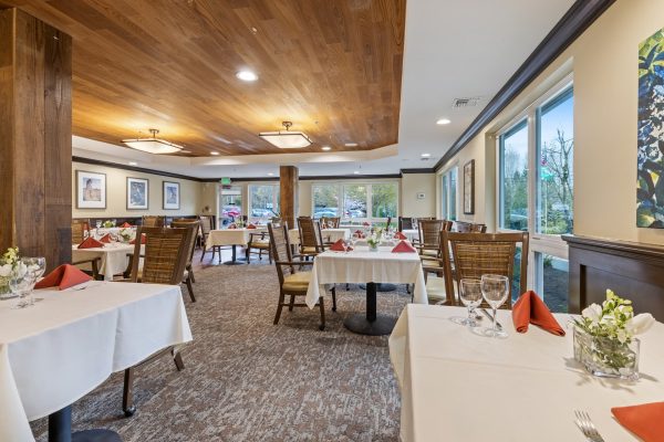 A large dining area with lots of tables and chairs