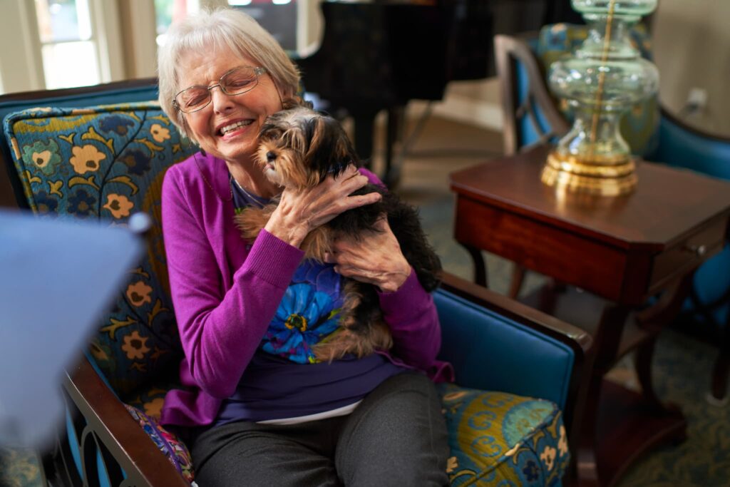 A resident with her puppy