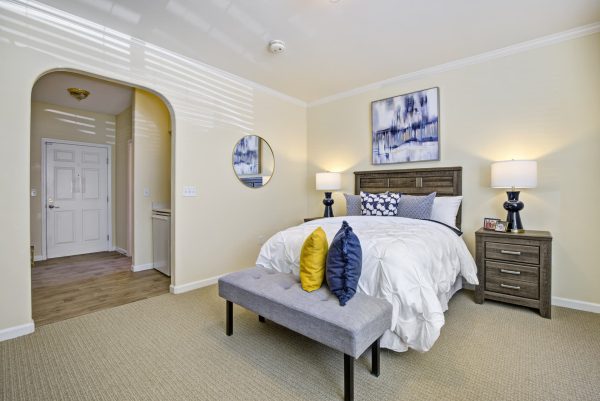 A serene bedroom with a cozy bed and two nightstands