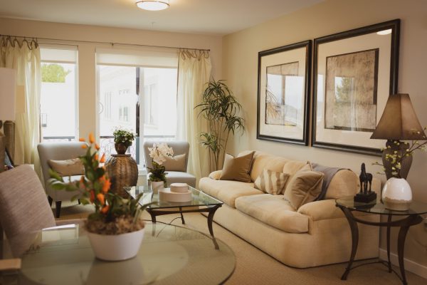 A cozy living space with a couch, armchairs, and a coffee table