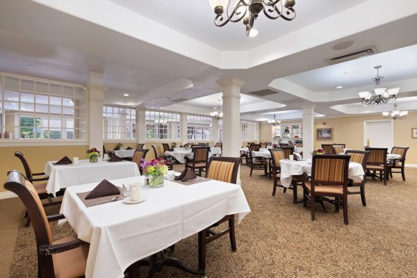 A large dining area with tables and chairs