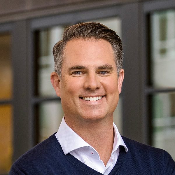 Headshot of Chris Corrigal, SVP of Wellbeing at Aegis Living