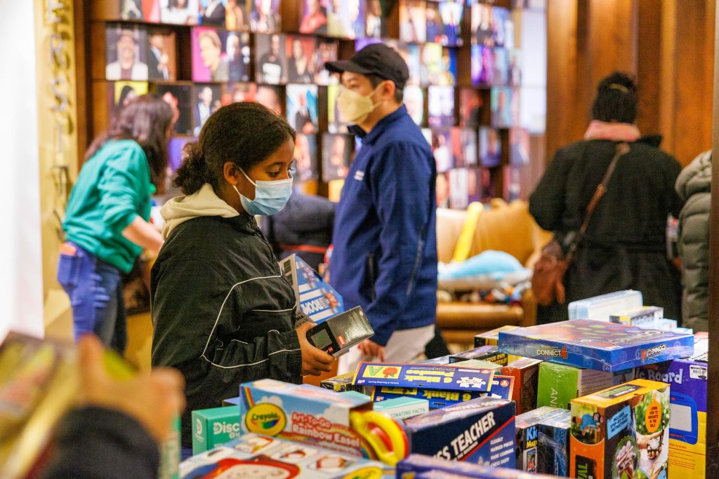 People wearing masks and shopping