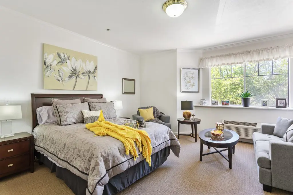 Cozy bedroom with large bed and natural light
